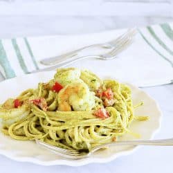 Fettuccine and Shrimp with Arugula Pesto Cream Sauce. Does that sound like date night restaurant food, or what?!  Here's the thing - it's so ridicuously easy, you can whip up this dinner in about 30 minutes, and no one has to know.