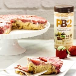 A plate of Strawberry Peanut Butter Baked French Toast made with PB2 powdered peanut butter.