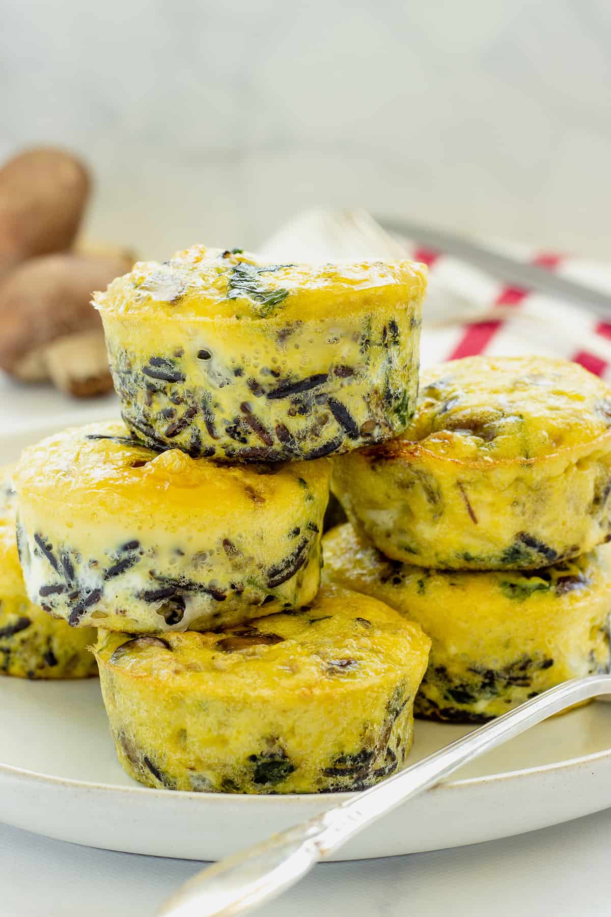 A closeup shot of a stack of egg muffin cups