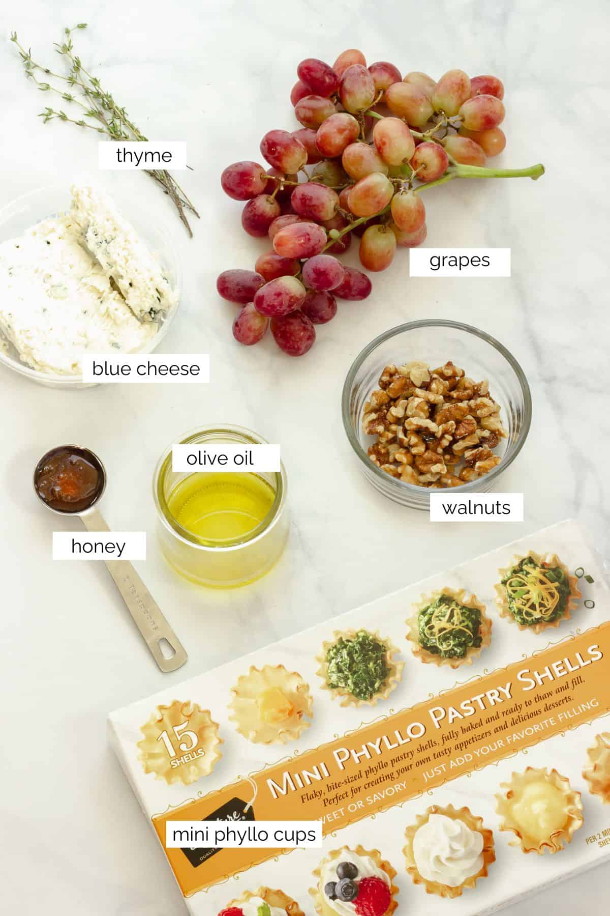 Ingredients needed to make roasted grapes phyllo cup appetizers.