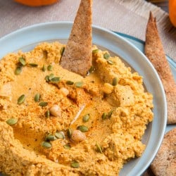 an overhead shot of pumpkin hummus