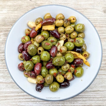 A bowl of marinated olives.